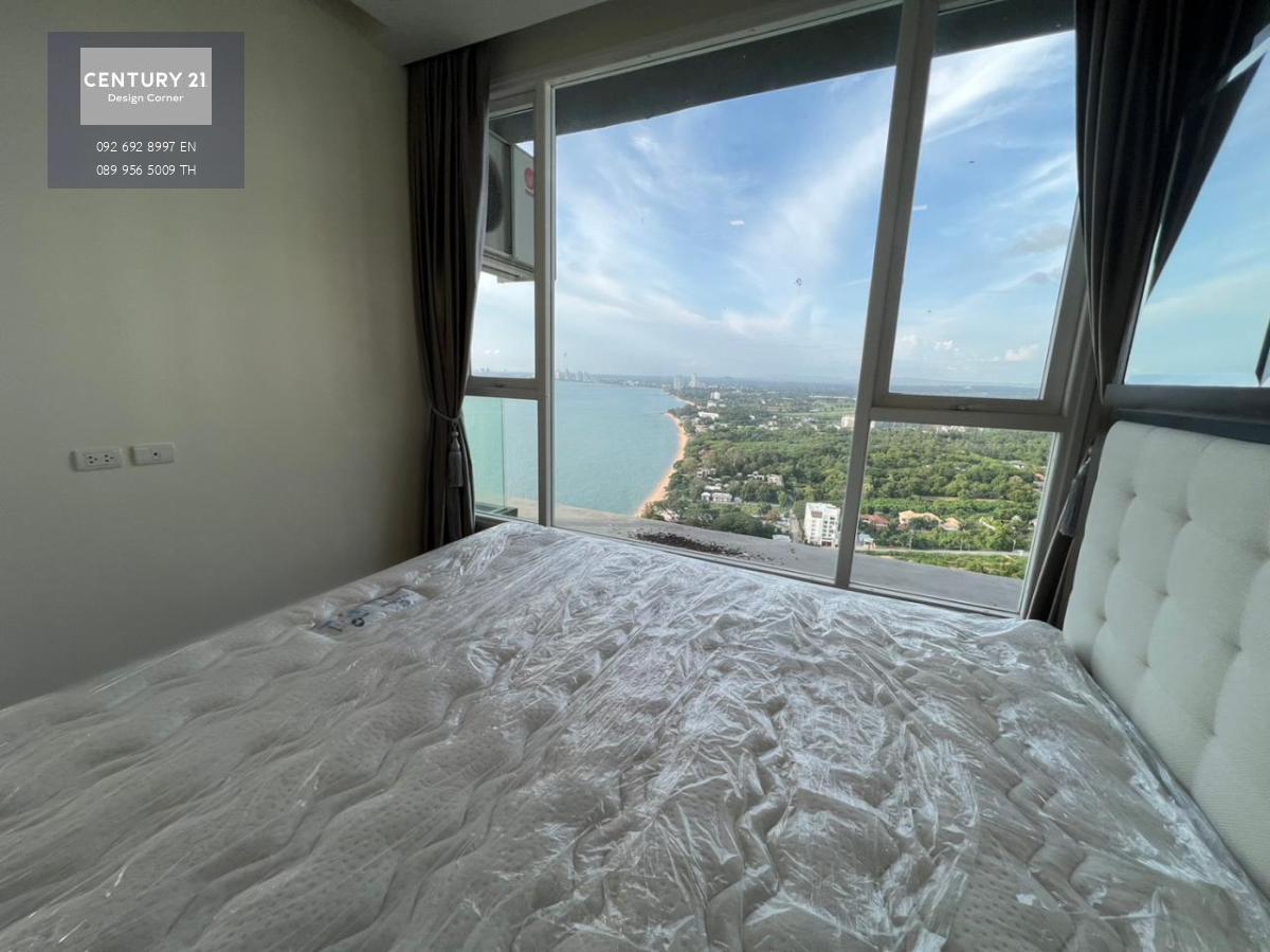 This beautiful sea-view condominium is for sale and it comes at the price of 6,200,000฿ Corner unit One bedroom & one bathroom 50 square meters Foreign Quota Condo features: Corner unit Sea-view from almost every corner of the unit Ceiling-to-floor glass 